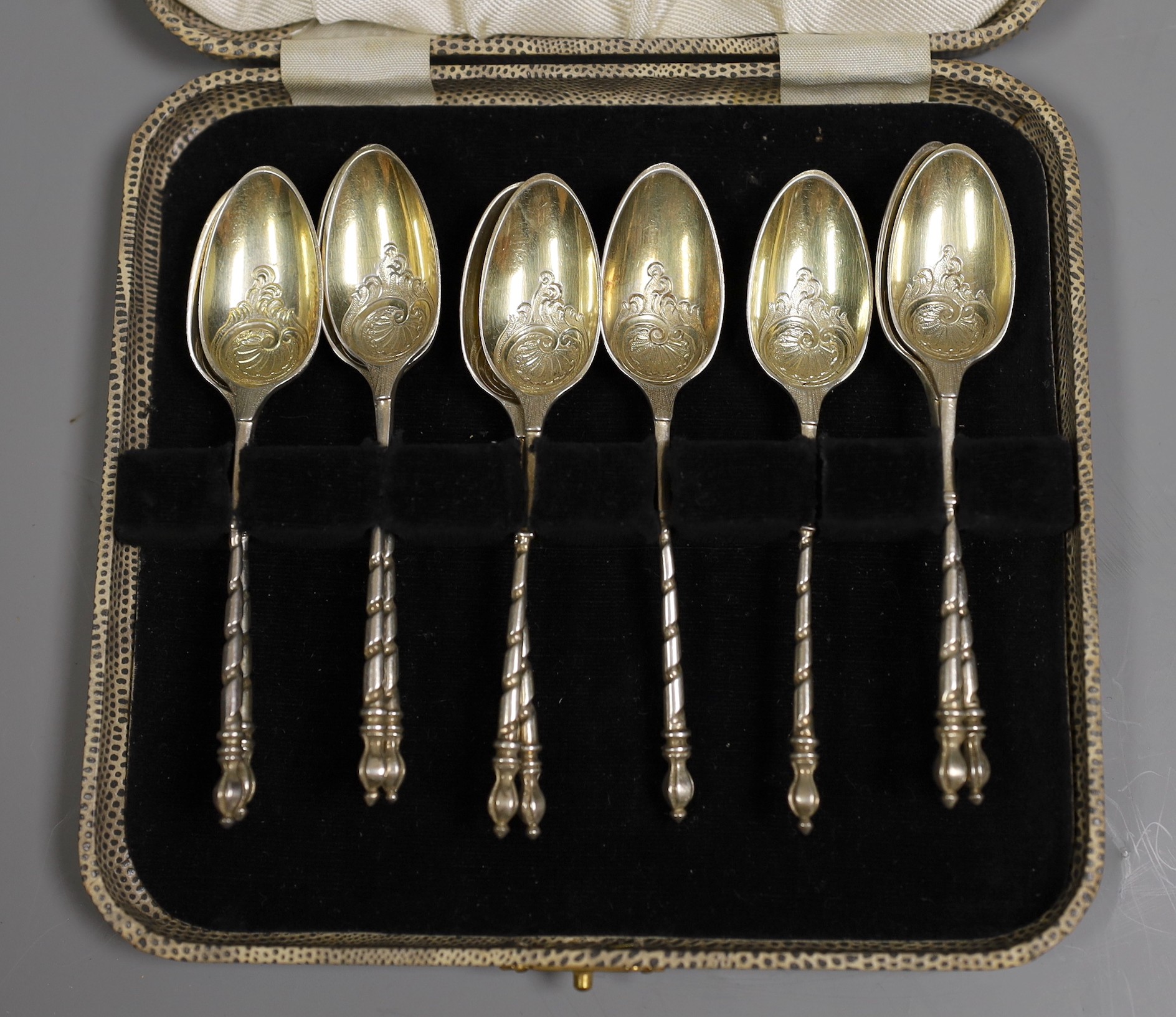 A set of ten Victorian chased silver tea spoons, by George Adams, London, 1874, 135 grams.